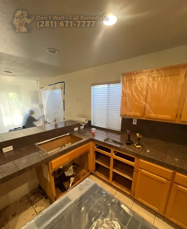 Old countertop and lower cabinets removed during the kitchen tear-out
